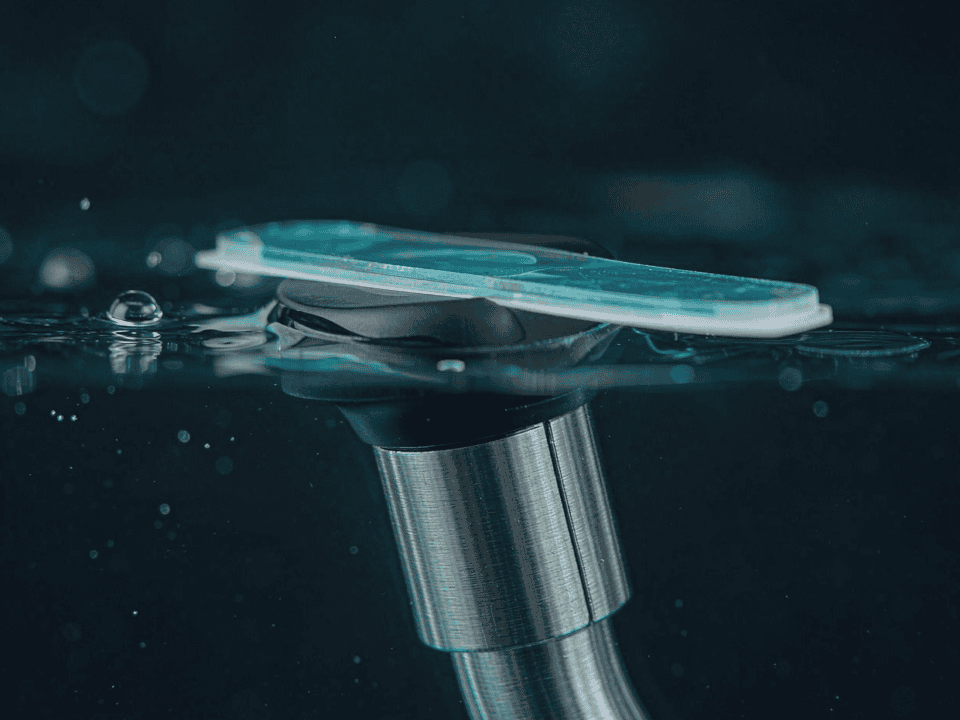 Optical dissolved oxygen sensor cap submerged in dark water