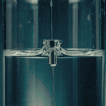 Platinum ORP electrode tip immersed in a beaker of clear water